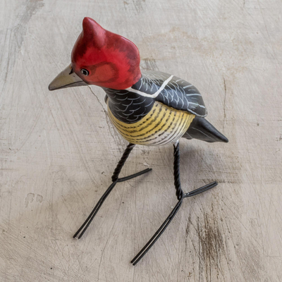 Ceramic figurine, 'Helmeted Woodpecker' - Handcrafted Posable Ceramic Helmeted Woodpecker Figurine