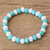 Crystal beaded stretch bracelet, 'Peaceful Heavens' - Handcrafted White and Sky Blue Crystal Stretch Bracelet