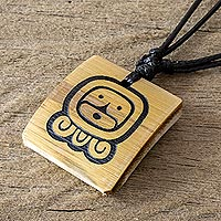 Bamboo pendant necklace, 'Mayan Life Force' - Mayan Life Force Glyph Unisex Bamboo Pendant Necklace