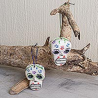Wood ornaments, 'Holiday Skulls' - Reclaimed Wood Skull Ornaments (Pair)