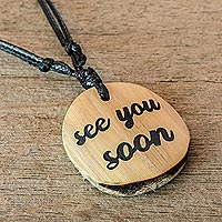 Bamboo pendant necklace, 'See You Soon' - Inscribed Bamboo Pendant Necklace on Cotton Cord