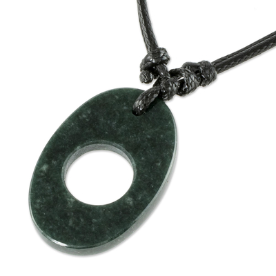 Unisex jade pendant necklace, 'Capsule in Dark Green' - Oval Shaped Jade Pendant Necklace