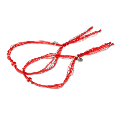 Beaded cord bracelets, 'For You and Me' (pair) - Red Cord Bracelets with Red Glass Beads (Pair)