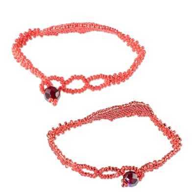 Beaded wristband friendship bracelets, 'Hearts in Strawberry' (pair) - Heart-Shaped Pendant Friendship Bracelets (Pair)