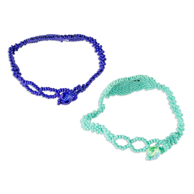 Beaded pendant friendship bracelets, 'Two Hearts in Aqua and Royal' (pair) - Blue and Aqua Glass Beaded Friendship Bracelets (Pair)