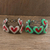Beaded wristband friendship bracelets, 'Hearts and More Hearts' (pair) - Adjustable Beaded Heart Motif Friendship Bracelets (Pair)