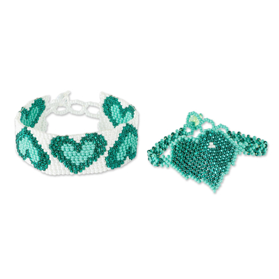 Beaded wristband friendship bracelets, 'Hearts in Green' (pair) - Green Heart Friendship Bracelets from Guatemala (Pair)