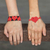 Beaded wristband friendship bracelets, 'Hearts in Red' (pair) - Red Heart Themed Beaded Friendship Bracelets (Pair)