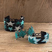 Beaded wristband friendship bracelets, 'Stars in Green' (set of 3) - Artisan Crafted Star Motif Friendship Bracelets (Set of 3)