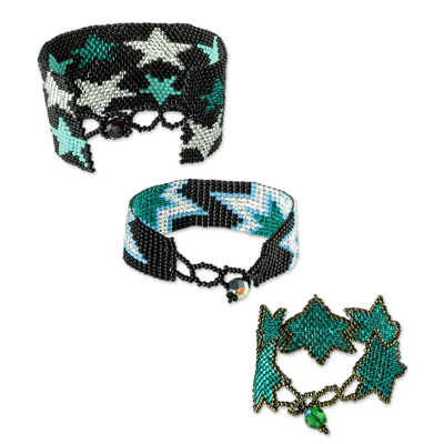 Beaded wristband friendship bracelets, 'Stars in Green' (set of 3) - Artisan Crafted Star Motif Friendship Bracelets (Set of 3)