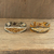 Beaded wristband friendship bracelets, 'Banner in Gold' (pair) - Hand Beaded Gold Toned Friendship Bracelets (Pair)