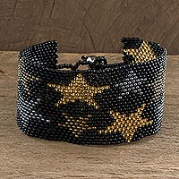 Beaded wristband bracelet, 'Constellation in Ebony' - Black Star Motif Beaded Bracelet from Guatemala