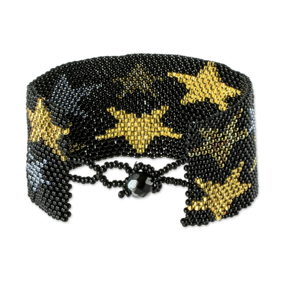 Beaded wristband bracelet, 'Constellation in Ebony' - Black Star Motif Beaded Bracelet from Guatemala