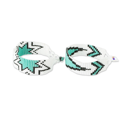 Beaded wristband friendship bracelets, 'Banner and Star' (pair) - Turquoise and White Beaded Friendship Bracelets (Pair)