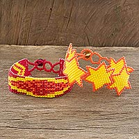 Beaded wristband friendship bracelets, 'Star and Banner in Yellow' (pair) - Yellow and Orange Beaded Friendship Bracelets (Pair)