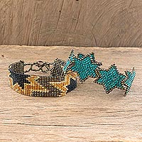 Beaded wristband friendship bracelets, 'Stars in Teal and Bronze' (pair)