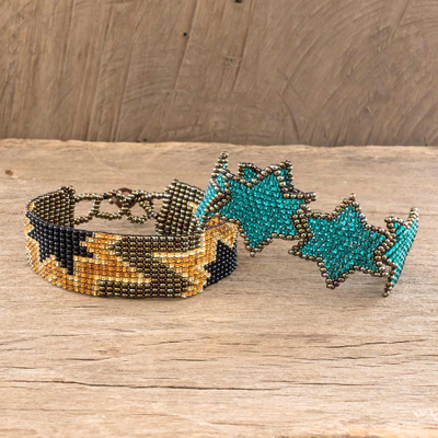 Beaded wristband friendship bracelets, 'Stars in Teal and Bronze' (pair) - 2 Hand Crafted Star Motif Glass Bead Friendship Bracelets