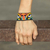 Beaded wristband bracelet, 'Tiger Stare' - Handmade Beaded Wristband Bracelet
