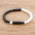 Onyx and crystal beaded stretch bracelet, 'Black and White Contrast' - Unisex Crystal and Black Onyx Stretch Bracelet thumbail