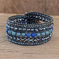 Beaded wristband bracelet, 'Boho Peacock' - Artisan Crafted Lava Stone and Crystal Bracelet