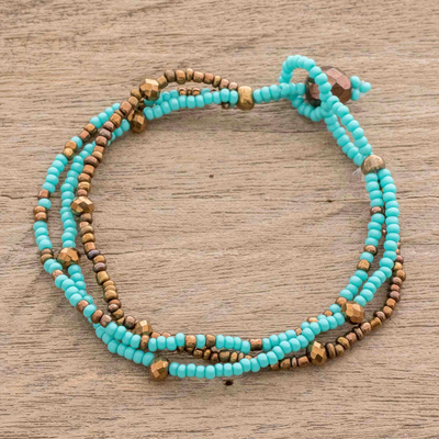 Glass beaded bracelet, 'Lines in Aqua' - Glass Bead Strand Bracelet in Aqua and Gold from Guatemala