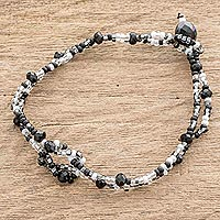 Glass beaded bracelet, 'Interlaced in Black' - Braided Glass Bead Bracelet in Black from Guatemala