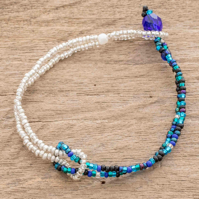 Glass beaded bracelet, 'Divine Union in Navy' - Glass Bead Knotted Bracelet in Aqua and Gold from Guatemala