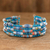 Recycled paper beaded cuff bracelet, 'Nature of Life in Blue' - Blue Paper and Glass Bead Cuff Bracelet