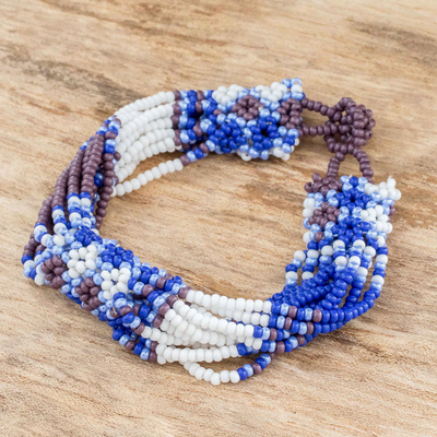 Beaded wristband bracelet, 'Flower Harmony in Lapis' - Blue and Purple Beaded Wristband Bracelet