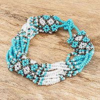 Beaded wristband bracelet, 'Flower Harmony in Turquoise' - Hand Beaded Bracelet from Guatemala
