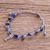 Lapis lazuli beaded charm bracelet, 'Blue Fish' - Fishbone Charm Lapis Lazuli Bracelet