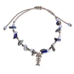 Lapis lazuli beaded charm bracelet, 'Blue Fish' - Fishbone Charm Lapis Lazuli Bracelet