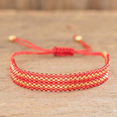 Gold-accented beaded wristband bracelet, 'Red Tracks' - Red and Gold Beaded Bracelet