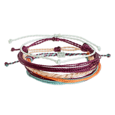 Braided cord bracelets, 'Free Traveler' (set of 4) - Hand Braided Multi Colored Cord Bracelets  (Set of 4)