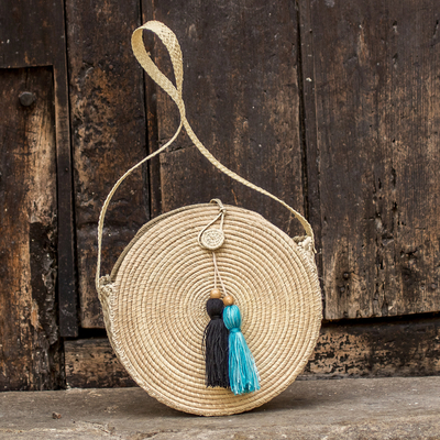 Natural fiber shoulder bag, 'Nicaraguan Tote' - Palm Fiber Woven Circular Tote Bag with Tassels