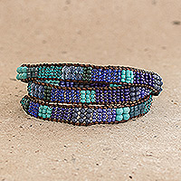 Glass bead wrap bracelet, 'Leather-Bound Sea' - Blue and Sea Green Beaded Bracelet with Leather Trim