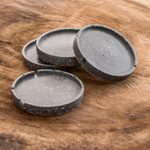 Cement coasters, 'Speckled Black' (set of 4) - Molded Cement Round Coasters in Speckled Black (Set of 4)