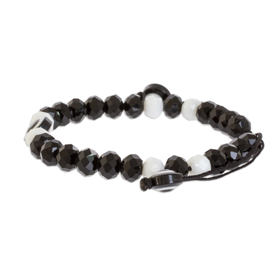 Beaded stretch bracelet, 'Black and White Amulet' - Unisex Crystal Black and White Adjustable Stretch Bracelet