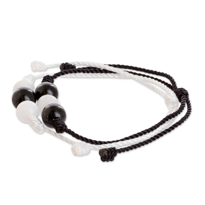 Jade and quartz cord bracelets, 'Opposite Energies' (pair) - White and Black Cord Bracelets with Jade and Quartz (Pair)