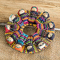 Cotton magnet, 'Joyfully United' - Handmade Guatemalan Quitapena Circular Cotton Magnet