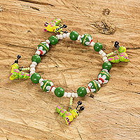 Ceramic beaded stretch bracelet, 'Merry Caterpillars' - Handcrafted Ceramic Beaded Stretch Bracelet in Green