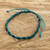 Macrame bracelet, 'Knot Uncommon in Teal' - Artisan Crafted Macrame Wristband Bracelet