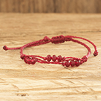 Beaded macrame bracelet, 'True Love Glow' - Red Beaded Macrame Bracelet from Guatemala