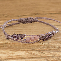 Beaded macrame bracelet, 'Starlight Glow' - Purple Beaded Macrame Bracelet from Guatemala