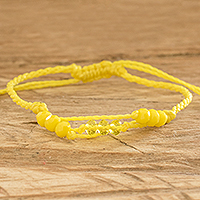 Beaded macrame bracelet, 'Sunlight Glow' - Yellow Beaded Macrame Bracelet from Guatemala