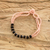 Glass and crystal beaded bracelet, 'Flamingo Hug' - Handmade Pink and Black Beaded Bracelet from Guatemala