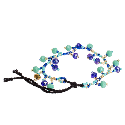 Glass and crystal beaded bracelet, 'Tropical Root' - Artisan Crafted Aqua Blue Charm Bracelet from Guatemala