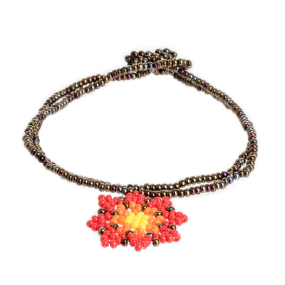 Beaded charm bracelet, 'Spring Flower' - Handmade Glass Beaded Bracelet with Charm from Guatemala
