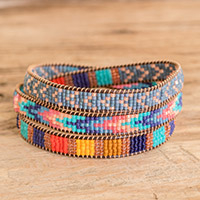 Glass beaded wrap bracelet, 'Geometric Variation' - Multicolor Glass Beaded Wrap Bracelet with Geometric Motifs