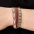 Glass beaded wrap bracelet, 'Geometric Direction' - Handcrafted Glass Beaded Wrap Bracelet with Arrow Pattern